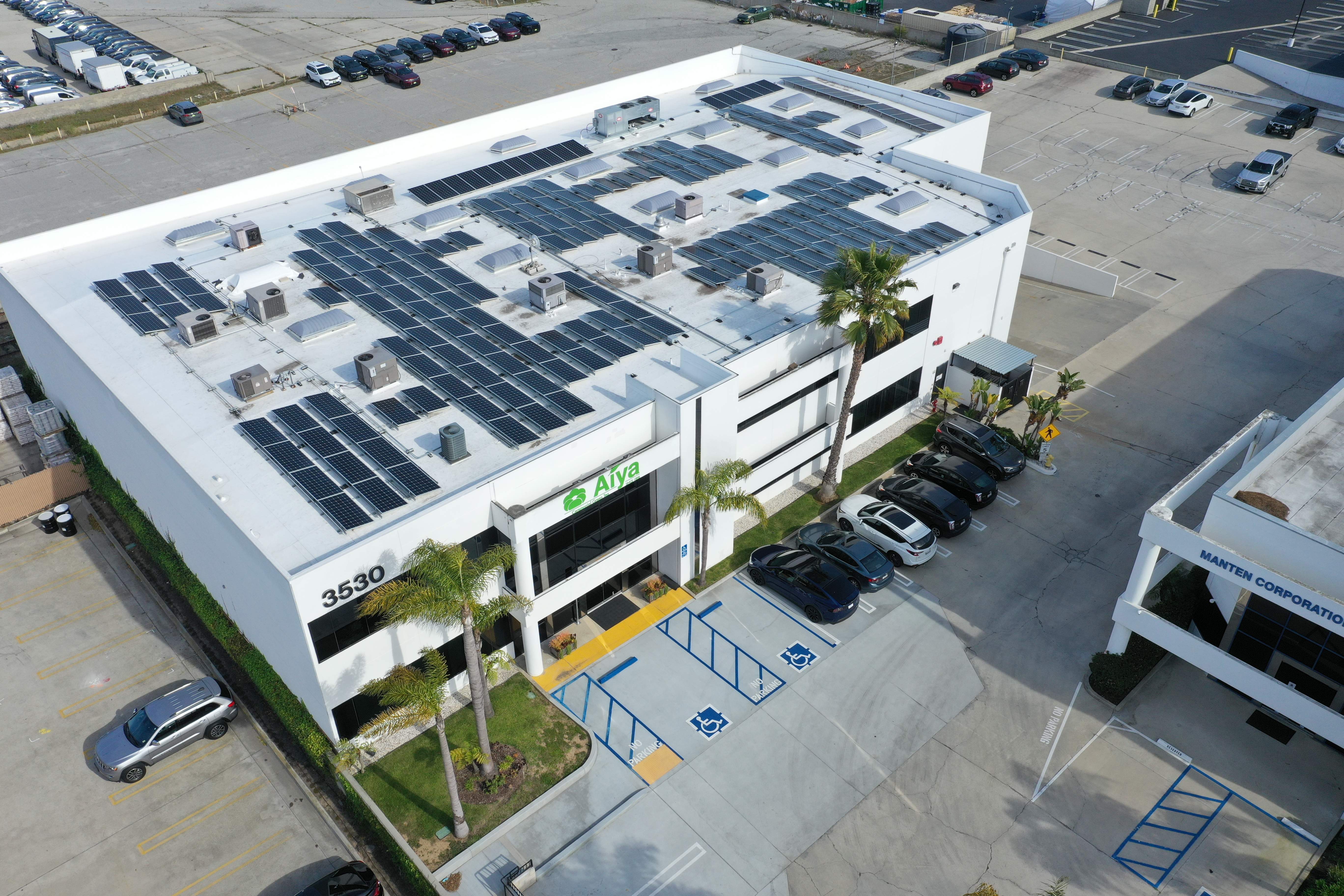 Aerial view of solar panels on a building.
